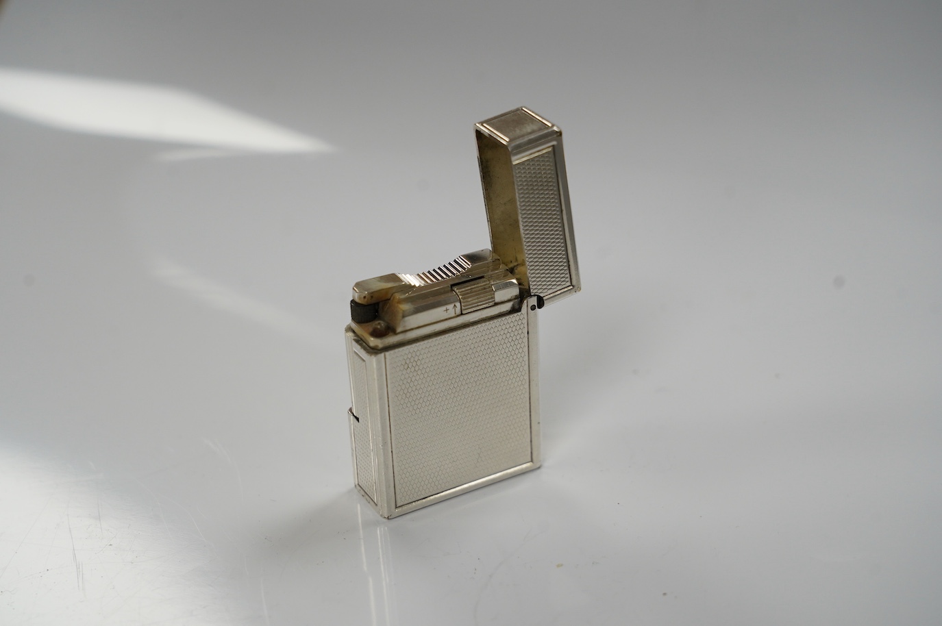 A cased Dupont lighter with instruction manual, etc. Condition - fair to good